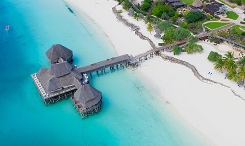 Home Aerial View Zanzibar Beach Resort Pier Pb M480x480 E1775726505171